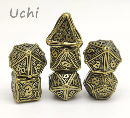 Un insieme Polyhedral durevole lucidato di 7 dadi, oro ha placcato l'insieme su ordinazione dei dadi del metallo