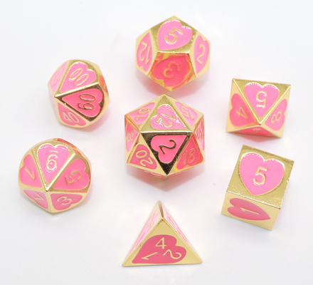 I dadi rosa portatili inodori del metallo, mano hanno scolpito il ruolo che gioca i dadi