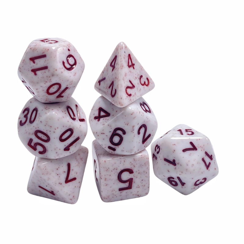 Parola rossa, minerale a macchie rosse, resina, personaggio che gioca a un gioco da tavolo.